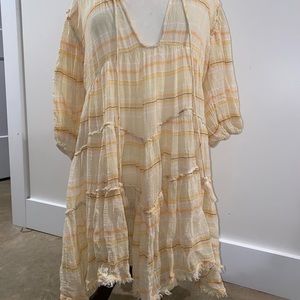 Free people yellow mini dress.